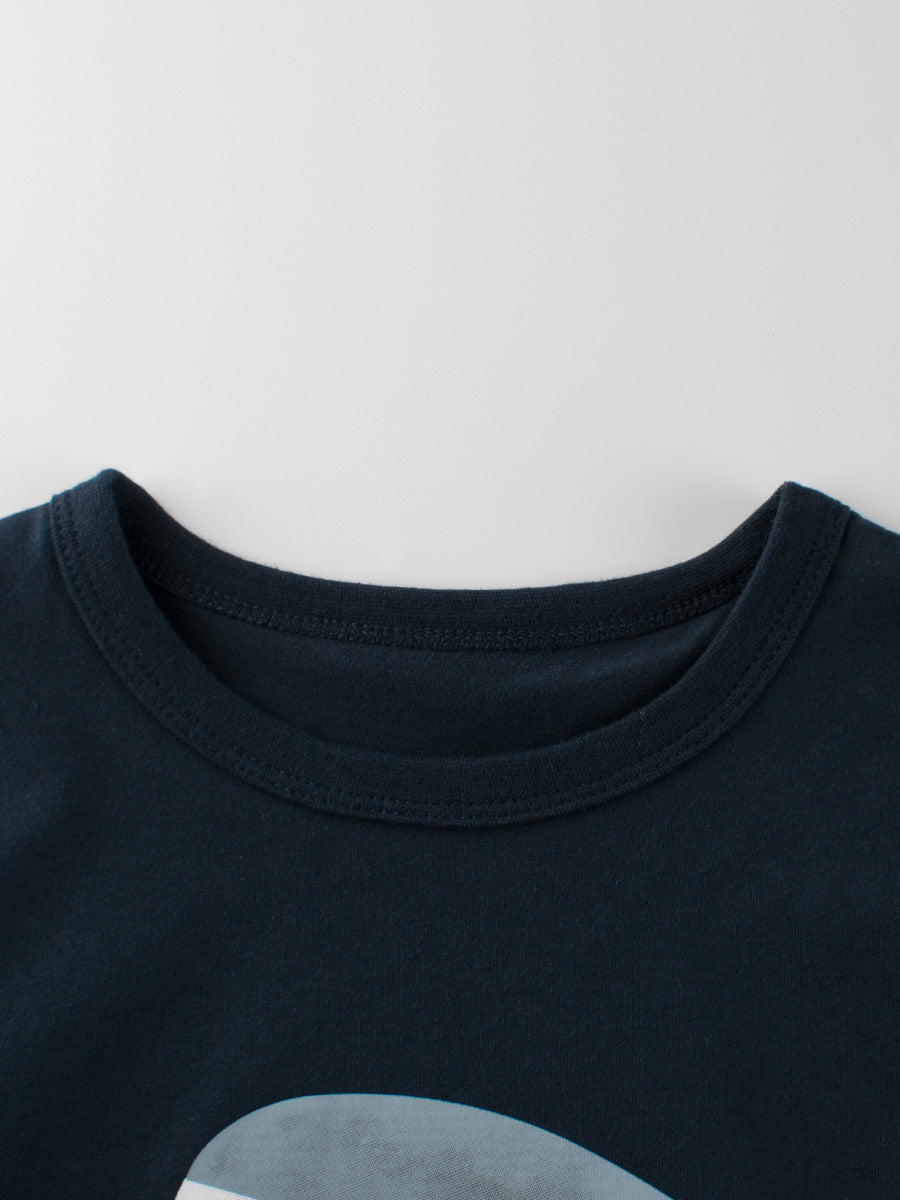 Boys' navy blue t-shirt featuring a playful Baby Shark cartoon pattern, perfect for summer wear.