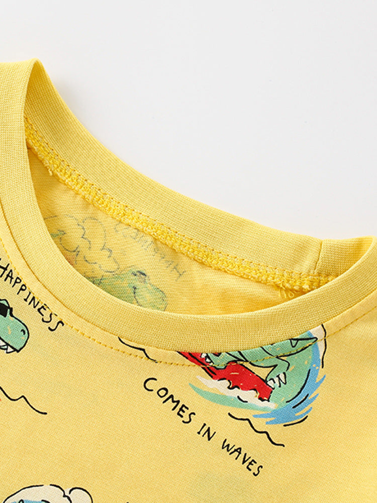 Boys' yellow short sleeves t-shirt featuring a cartoon dinosaur pattern, perfect for summer wear.