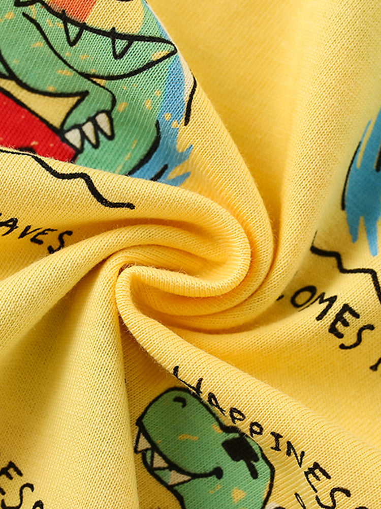 Boys' yellow short sleeves t-shirt featuring a cartoon dinosaur pattern, perfect for summer wear.