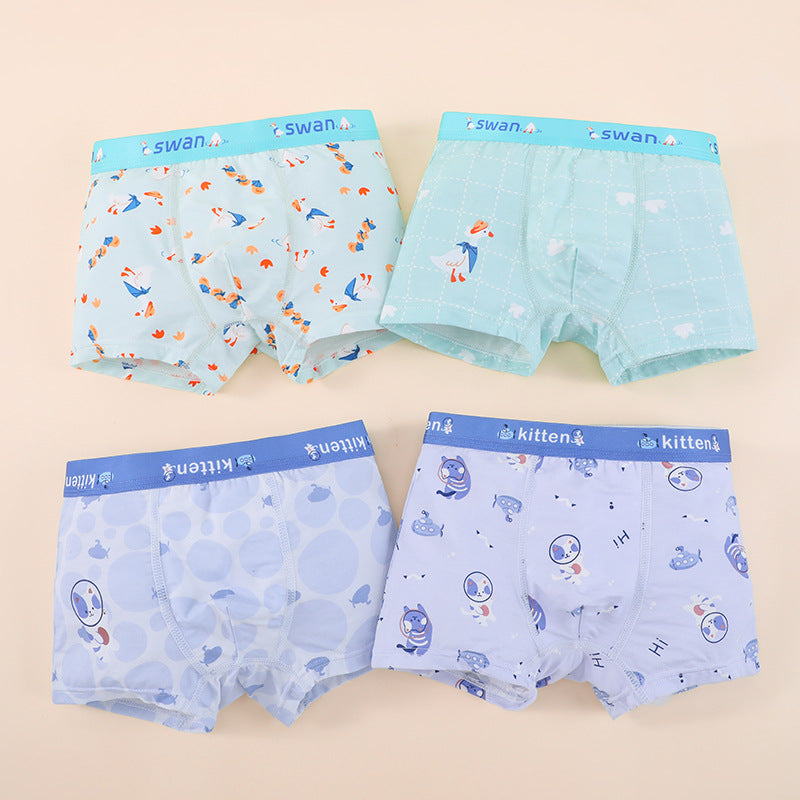 Boys' cartoon pattern printed boxer shorts in various colors, showcasing fun designs and breathable fabric.