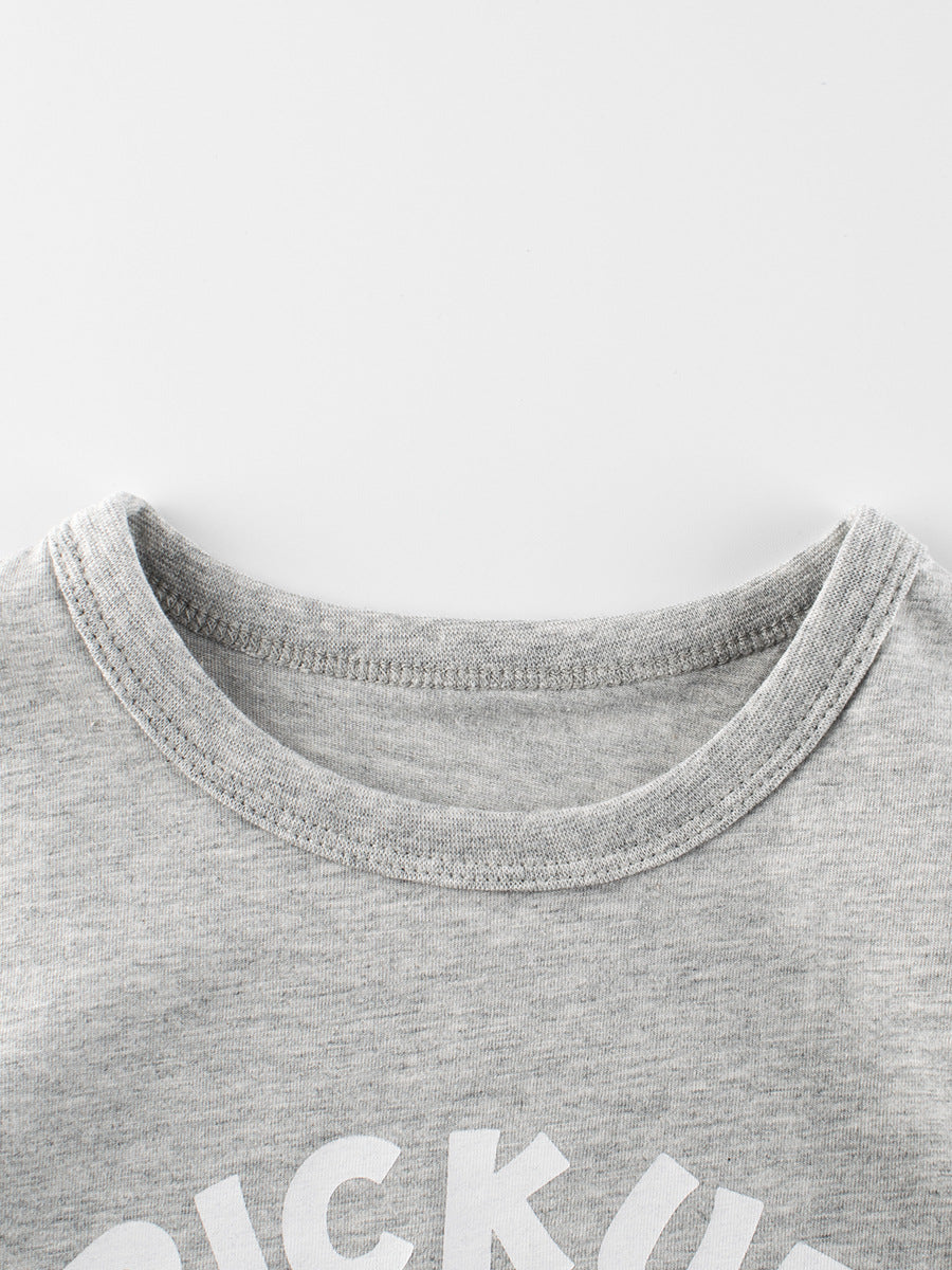 Boys’ grey cotton t-shirt featuring a colorful pick-up truck print, perfect for summer wear.