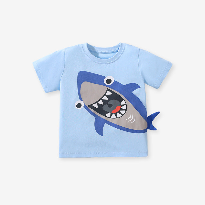Boys’ Shark Design T-Shirt in blue cotton, featuring a playful shark graphic, perfect for summer wear.