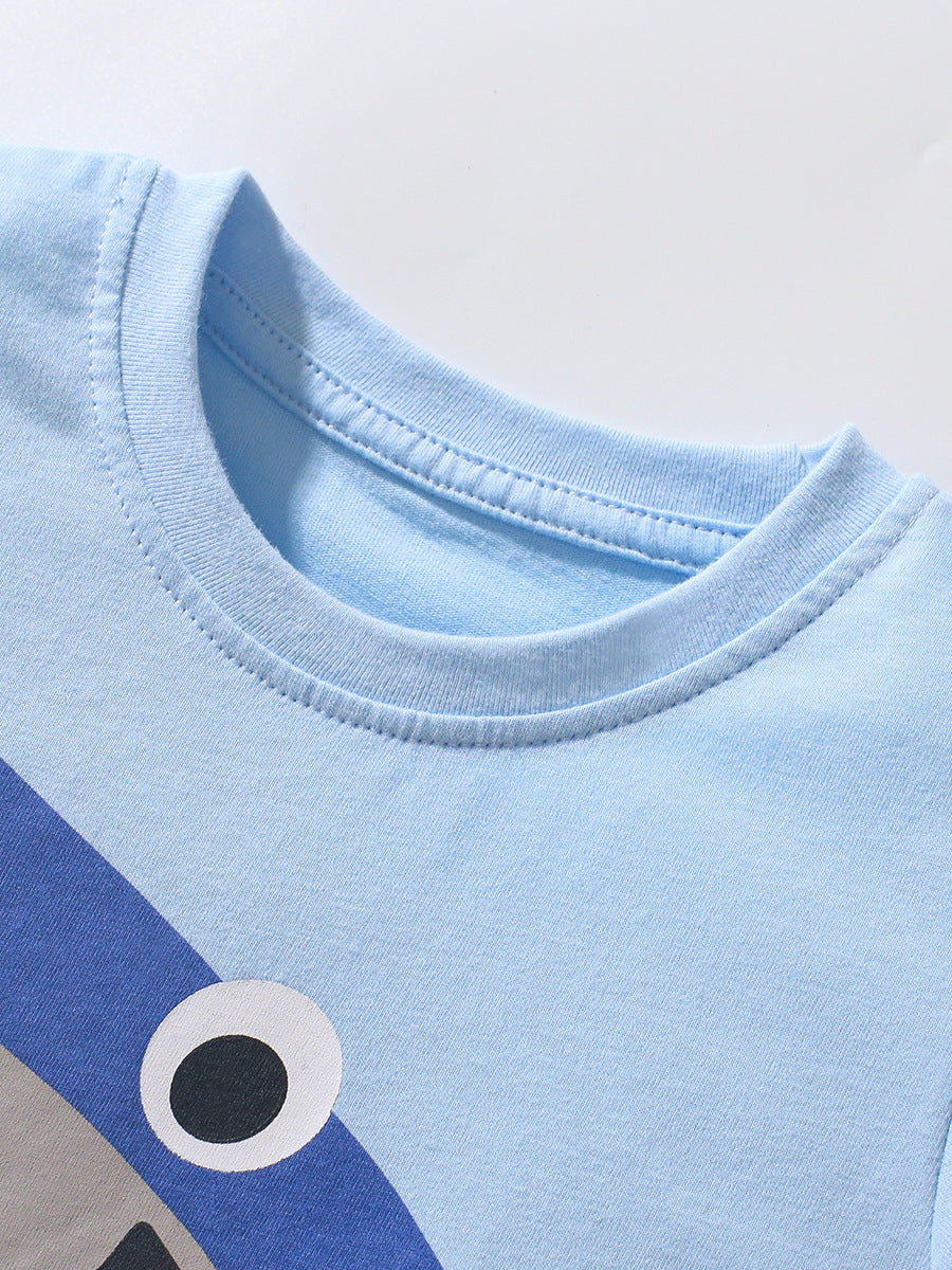 Boys’ Shark Design T-Shirt in blue cotton, featuring a playful shark graphic, perfect for summer wear.