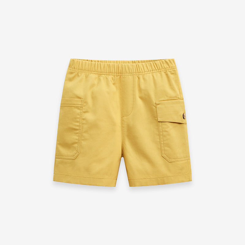Boys solid yellow cotton casual shorts with pockets, perfect for summer wear.