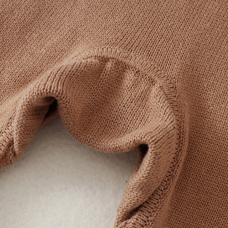 A soft brown knitted romper for babies, featuring long sleeves and a solid color design, perfect for both baby girls and boys.