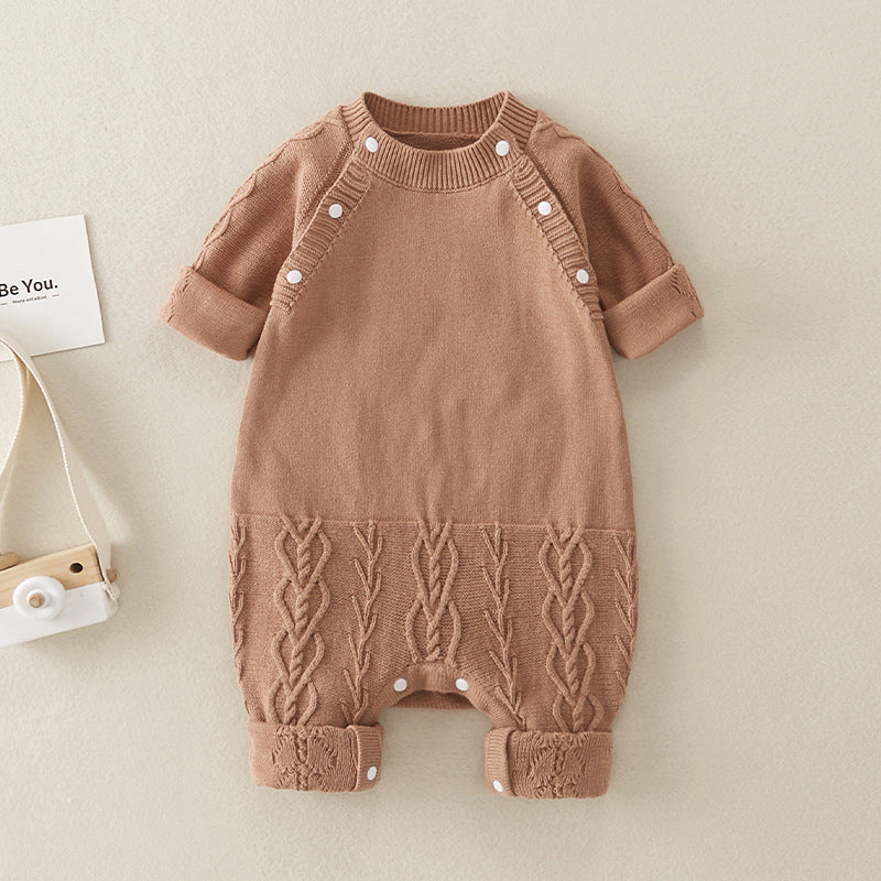 A soft brown knitted romper for babies, featuring long sleeves and a solid color design, perfect for both baby girls and boys.