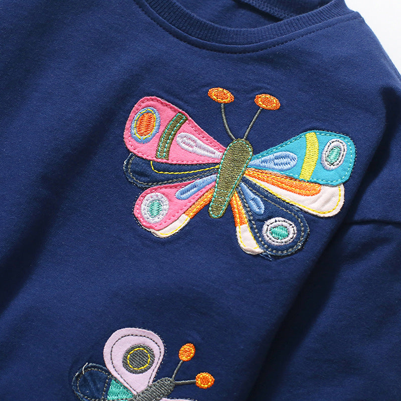 A navy blue soft cotton hoodie featuring a butterfly pattern, designed for young girls, perfect for autumn and spring wear.