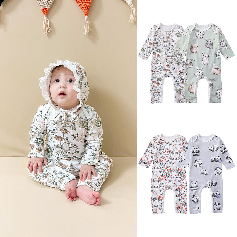 A collection of Cartoon Graphic Long Sleeve Outgoing Rompers in white, green, grey, and brown, showcasing playful cartoon patterns.