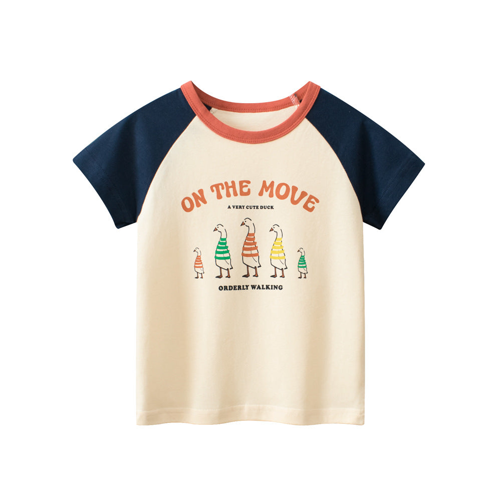Cartoon Print Girls’ T-Shirt in navy blue, yellow, and beige colors, showcasing a playful design suitable for summer wear.
