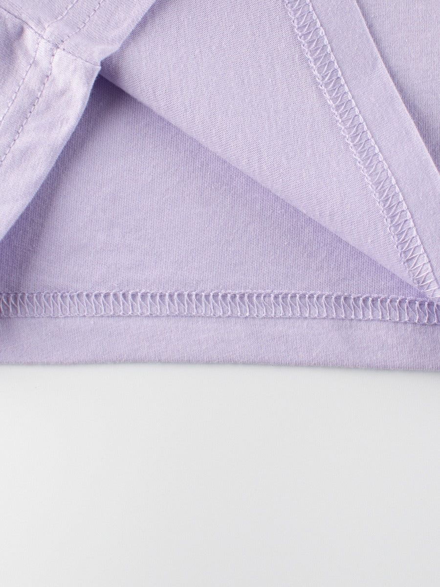 A vibrant purple girls' t-shirt featuring a cartoon rainbow cloud print, perfect for summer wear.