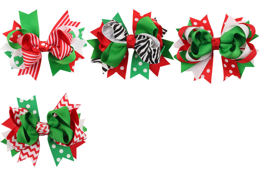 Set of 5 colorful Christmas-themed dovetail bow hair clips for girls, featuring various festive patterns.