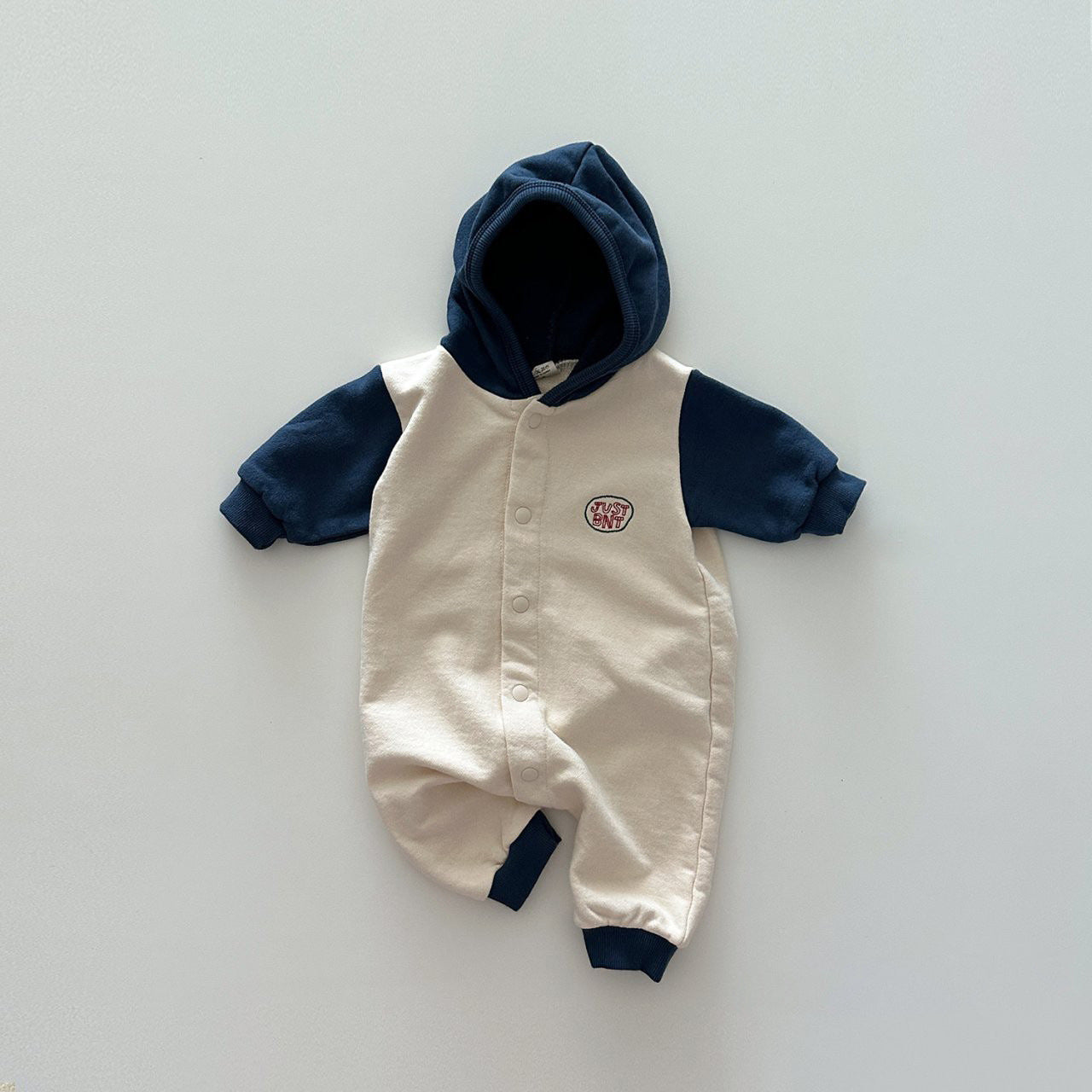 Contrast Color Design Soft Cotton Romper in navy blue and coffee for baby boys and girls, featuring a stylish patchwork design.
