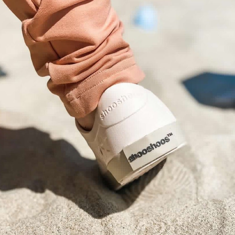 A modern curbside pickup service showcasing a vehicle parked outside a store, ready for order collection.