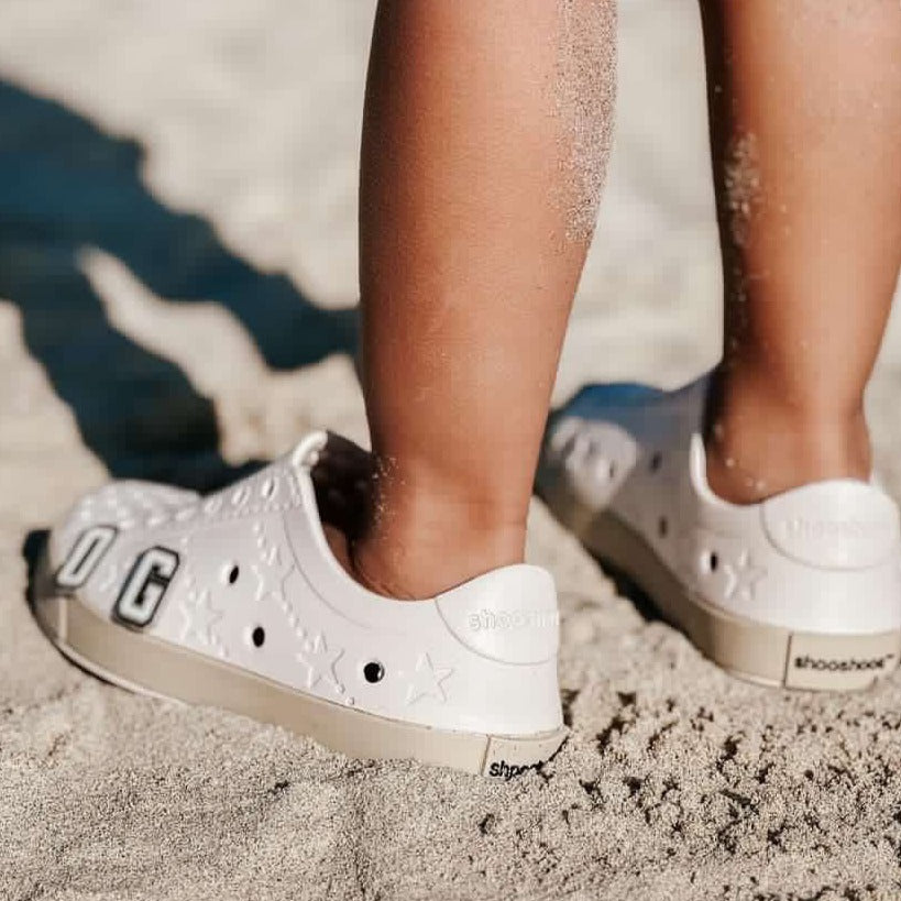 A modern curbside pickup service showcasing a vehicle parked outside a store, ready for order collection.