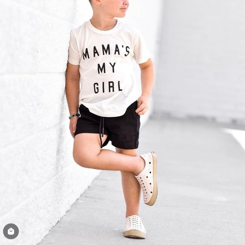 A modern curbside pickup service showcasing a vehicle parked outside a store, ready for order collection.
