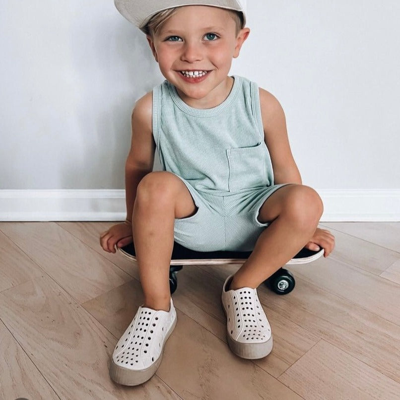 A modern curbside pickup service showcasing a vehicle parked outside a store, ready for order collection.