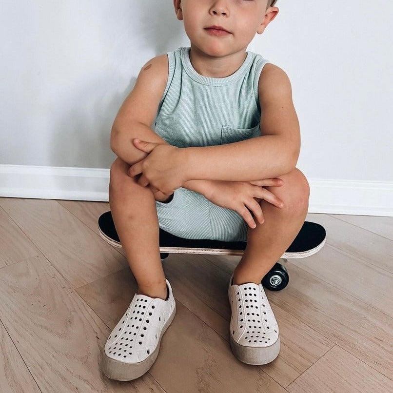A modern curbside pickup service showcasing a vehicle parked outside a store, ready for order collection.