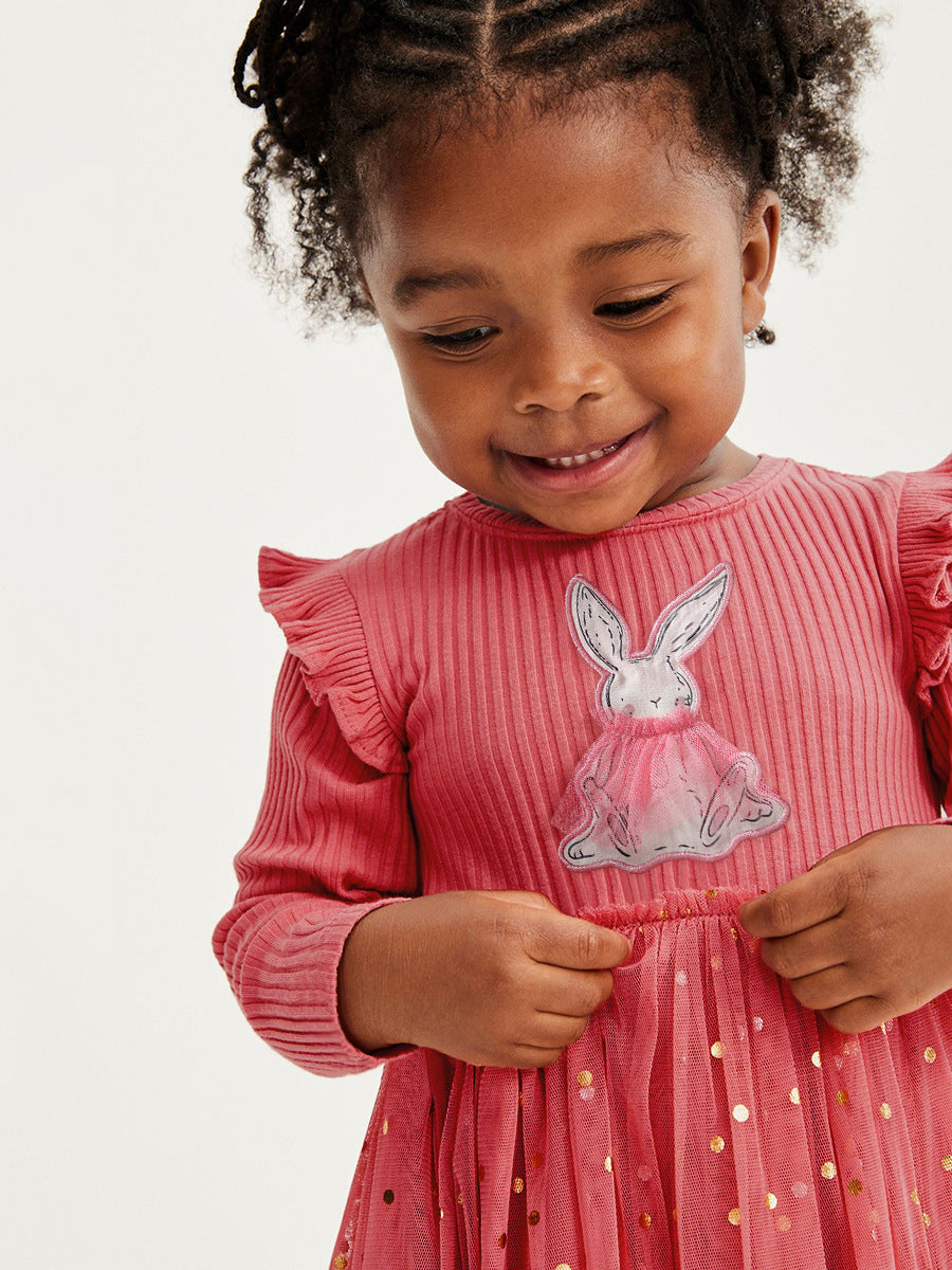 A vibrant red long sleeve shirt featuring a cute cartoon rabbit pattern, perfect for girls aged 12 months to 10 years.