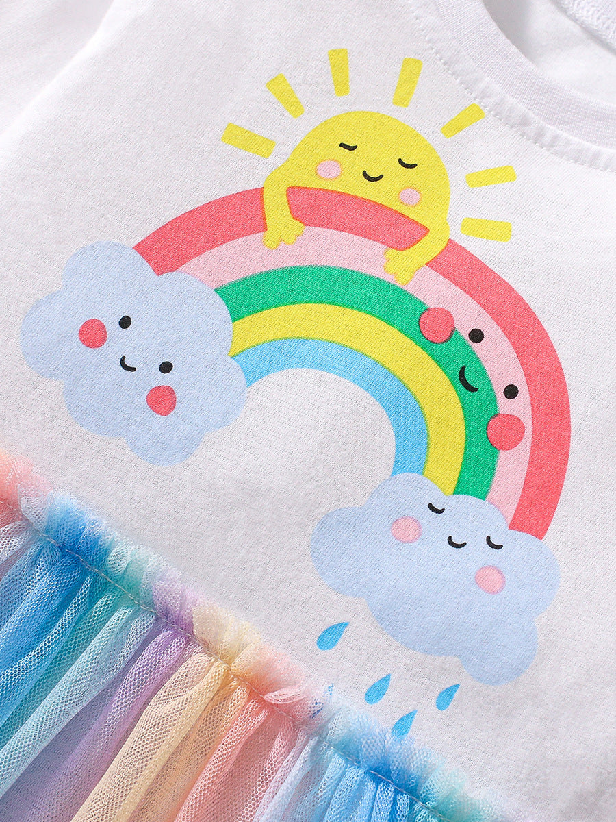 Colorful long sleeve shirt for girls featuring a cartoon rainbow and clouds pattern, made from soft cotton material.