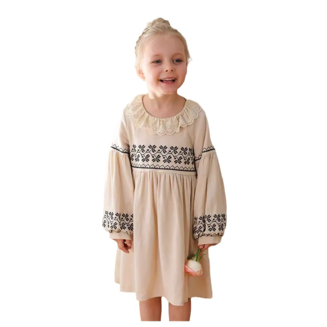 A stylish long dress for girls featuring floral and geometric patterns with a ruffle collar in apricot color.