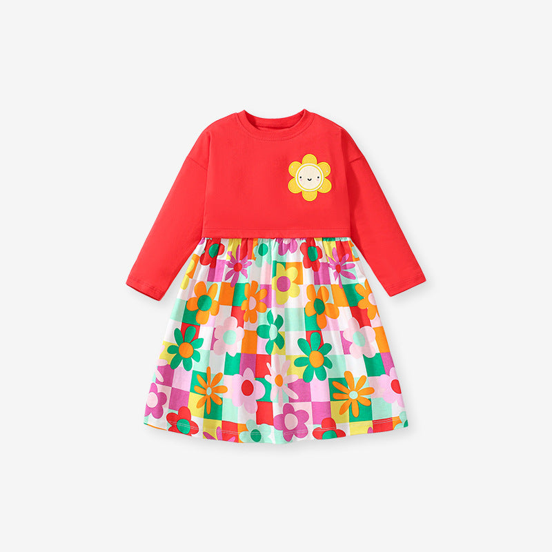 A vibrant red long dress for girls featuring floral and plaid patterns, perfect for autumn wear.