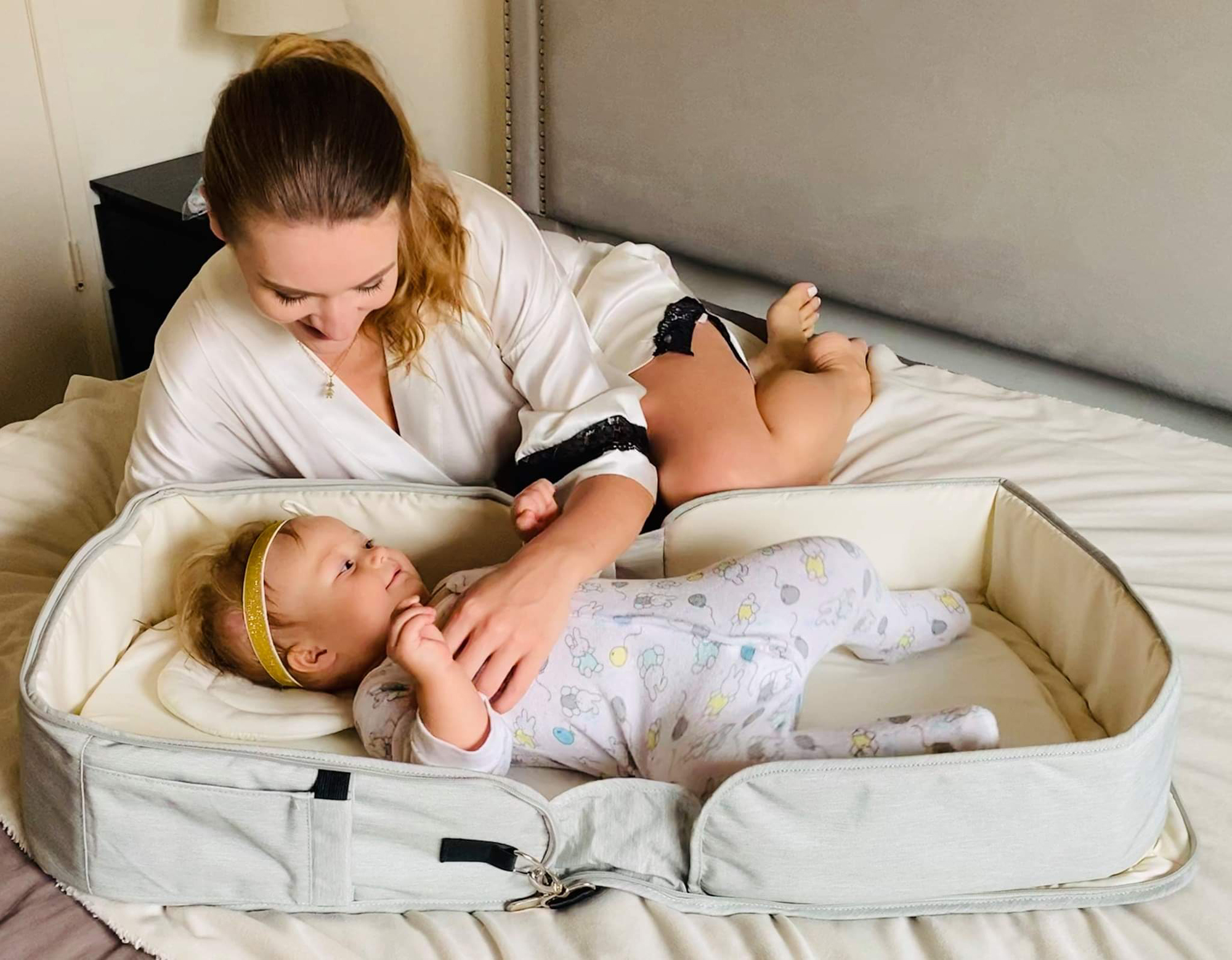 Diaper Bag and Portable Foldable Changing Table in a stylish design, showcasing its compact and foldable features for easy storage and portability.