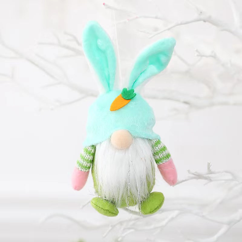 Colorful Easter Bunny Gnome Doll in pink, blue, green, and yellow, made from plastic and cloth, perfect for festive decorations.