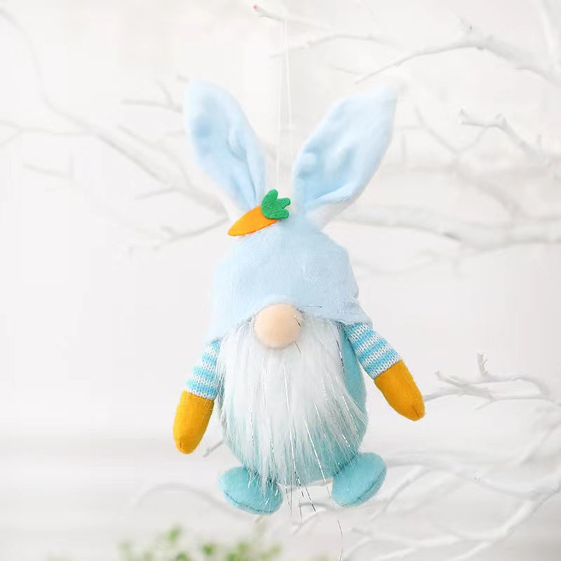 Colorful Easter Bunny Gnome Doll in pink, blue, green, and yellow, made from plastic and cloth, perfect for festive decorations.