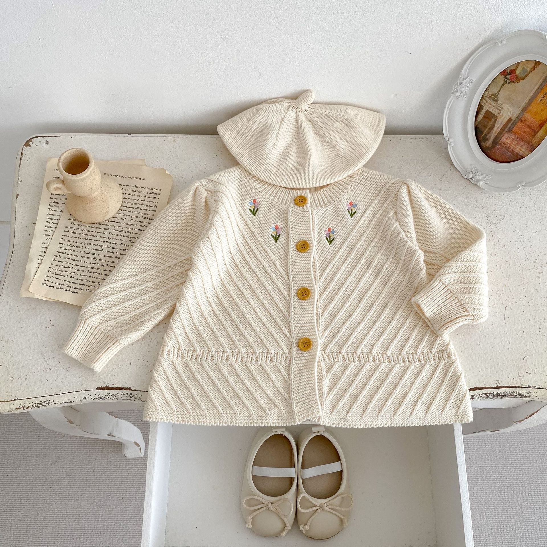 Embroidered Design High Quality Knit Cardigan in beige for baby girls, featuring floral embroidery and soft cotton material.