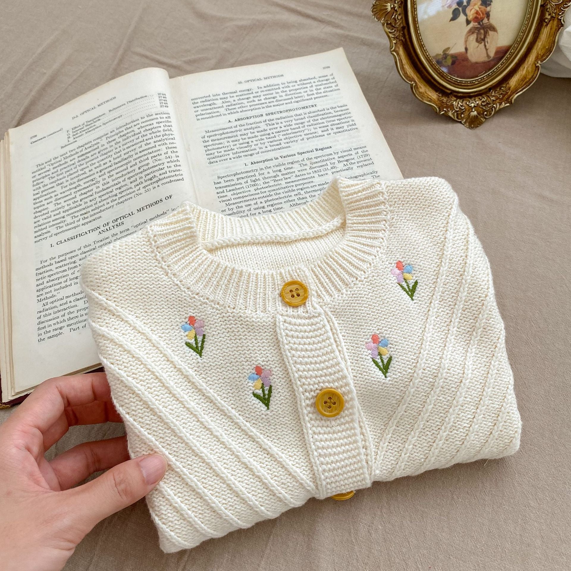 Embroidered Design High Quality Knit Cardigan in beige for baby girls, featuring floral embroidery and soft cotton material.