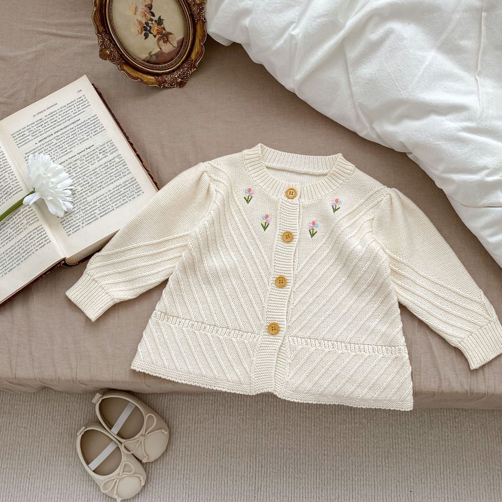 Embroidered Design High Quality Knit Cardigan in beige for baby girls, featuring floral embroidery and soft cotton material.