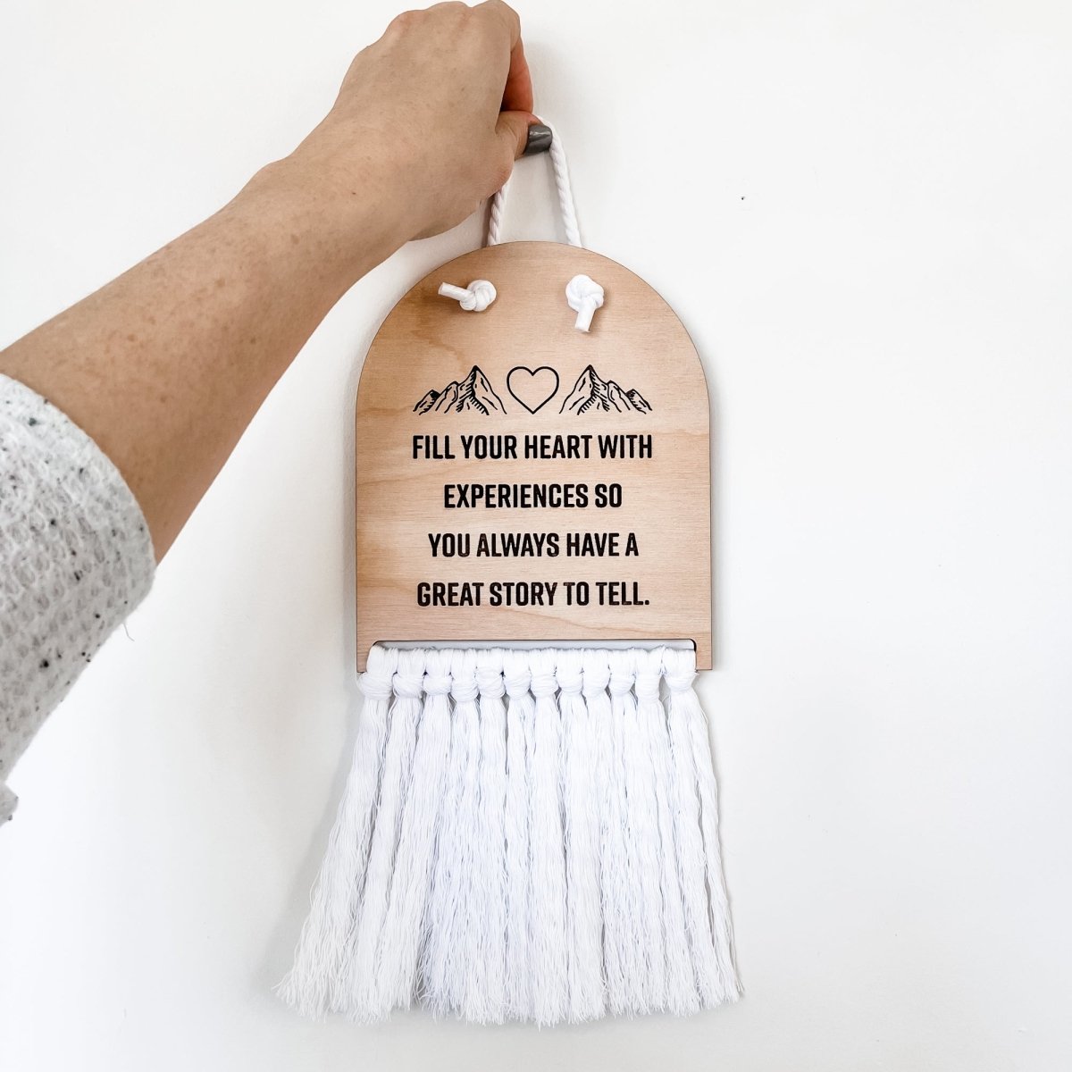 Half Moon Macrame Sign featuring laser cut lettering and white hanging rope, perfect for home decor.