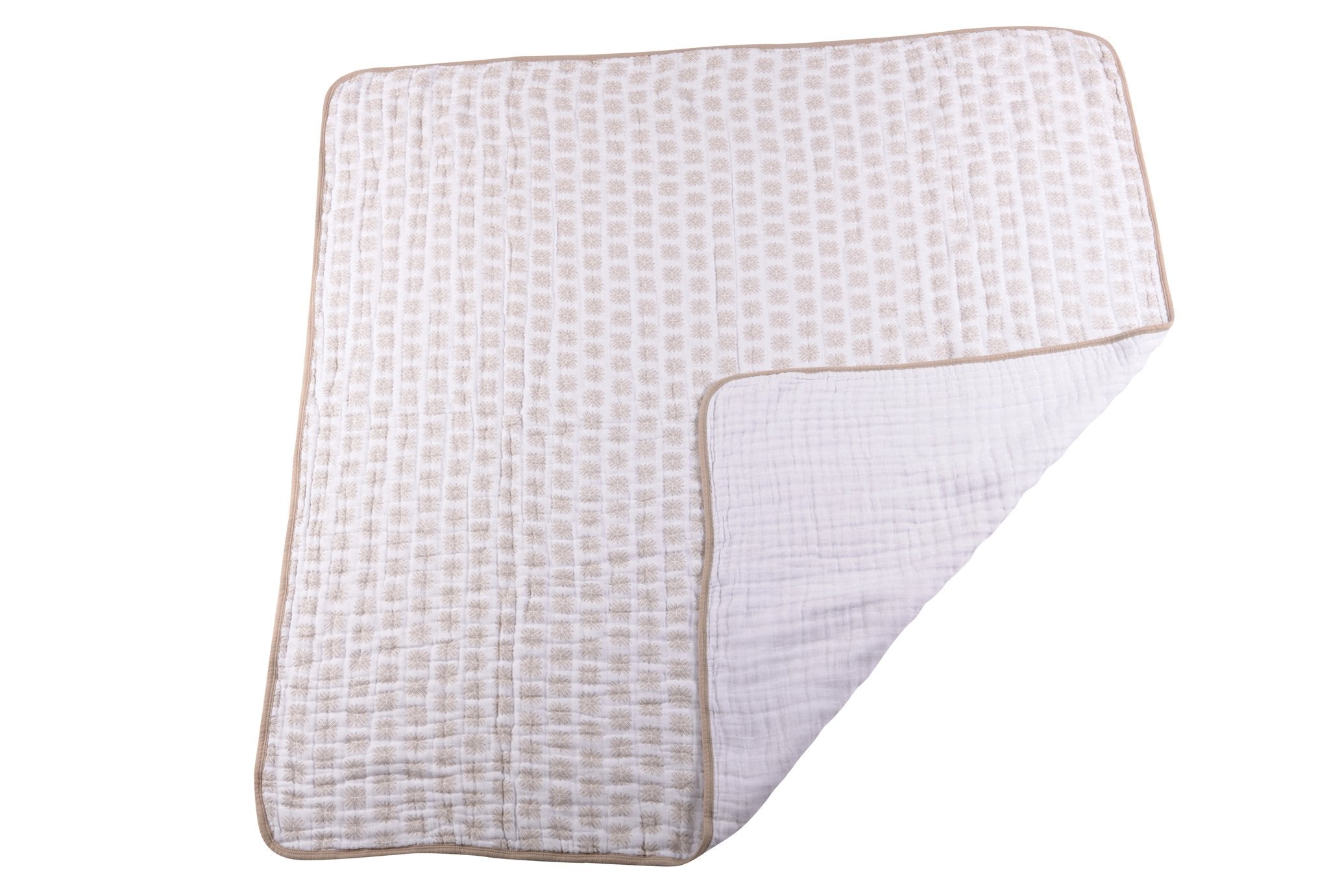 Flower Child Cotton Muslin Newcastle Blanket showcasing its soft, breathable, and cozy four-layer design in a vibrant pattern.