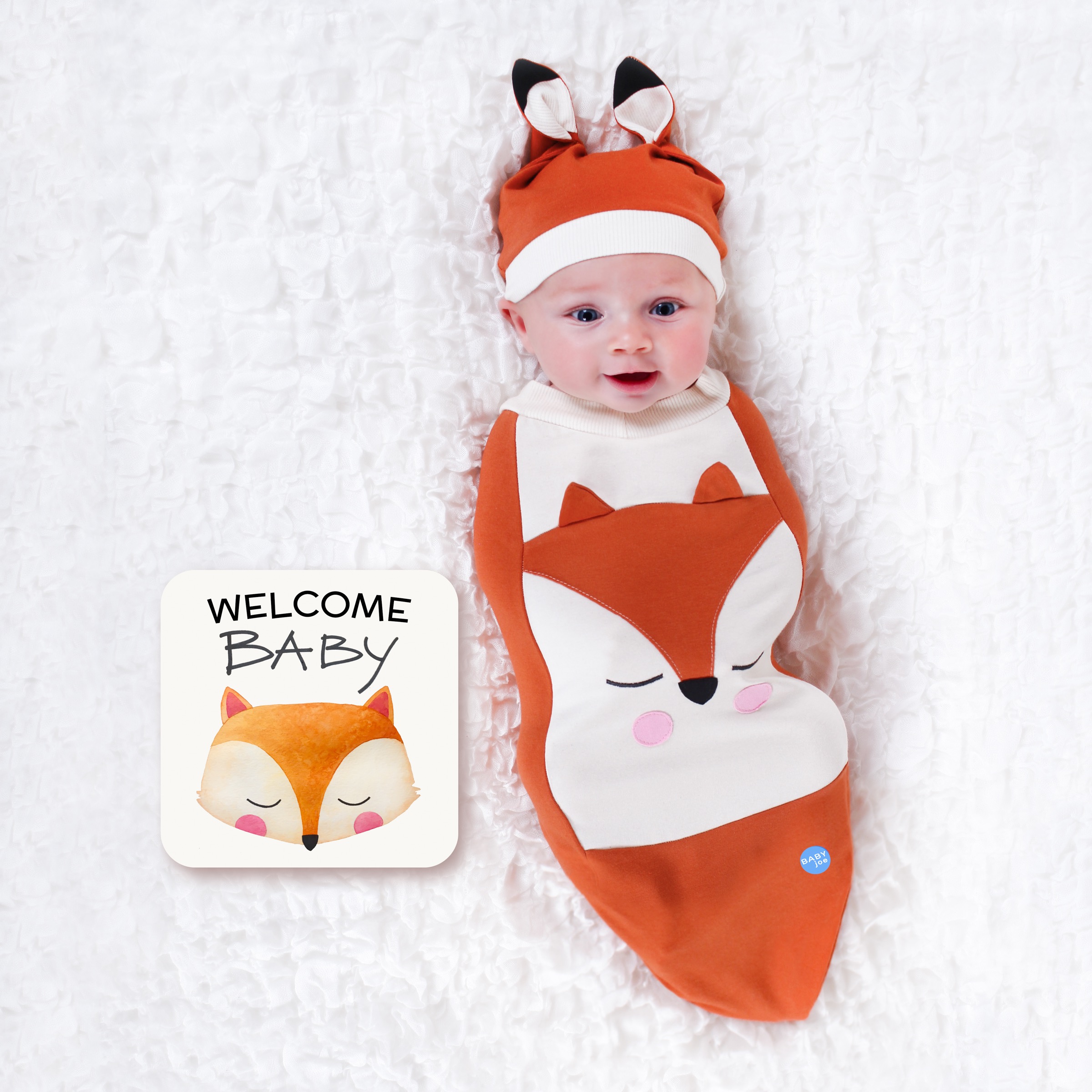 Fox Baby cocoon swaddle set including swaddle, headpiece, and announcement card, designed for newborns.
