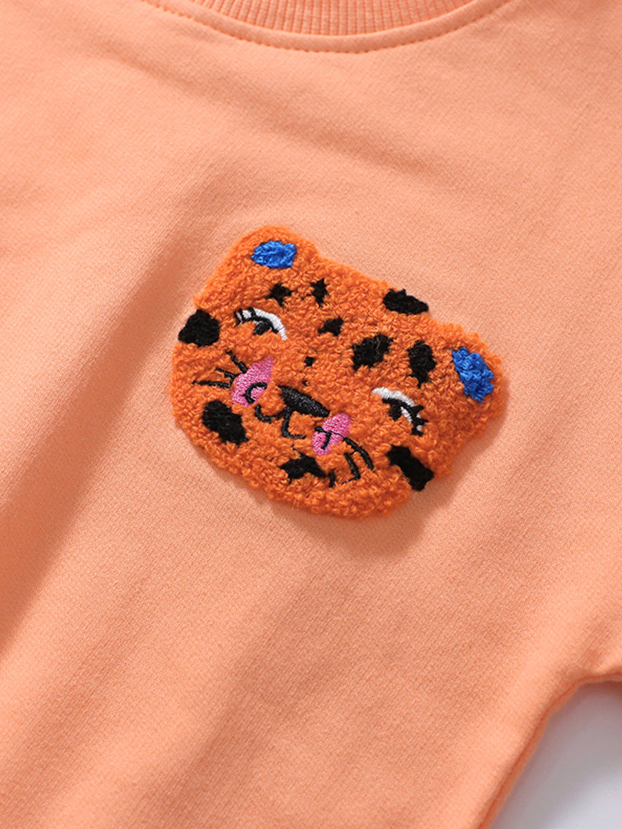 Girls Animals Cartoon Collection Top Pullover and Pants Set in vibrant orange with playful animal designs, perfect for young girls.