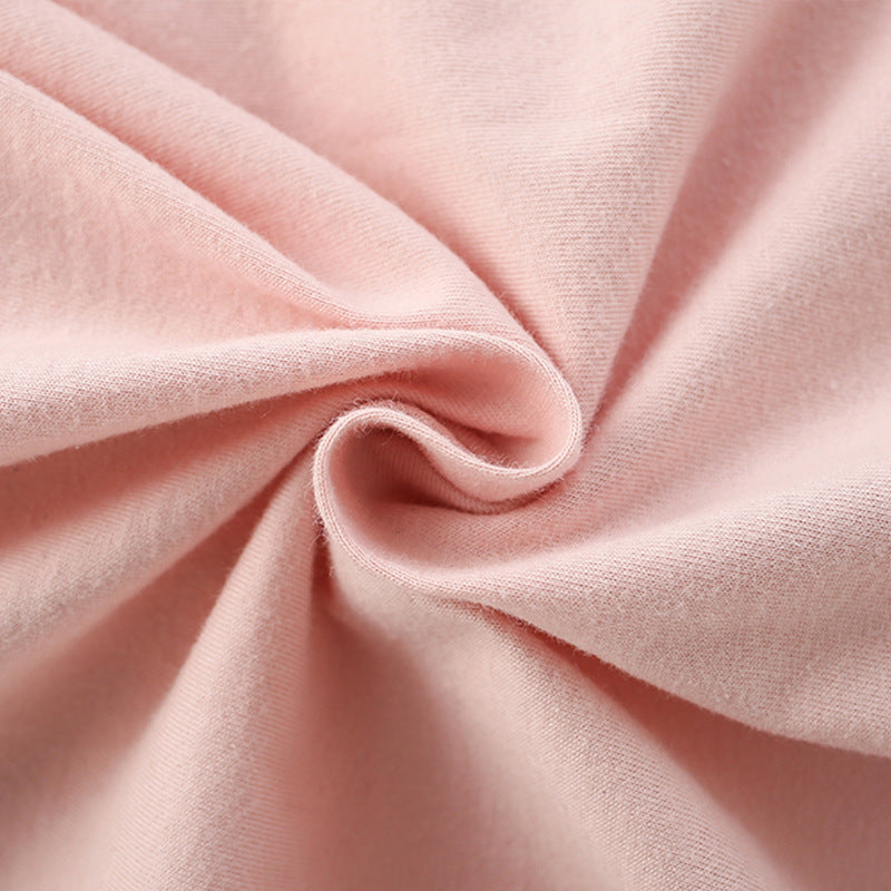 Girls' pink short sleeves t-shirt featuring a cartoon unicorn pattern, perfect for summer wear.