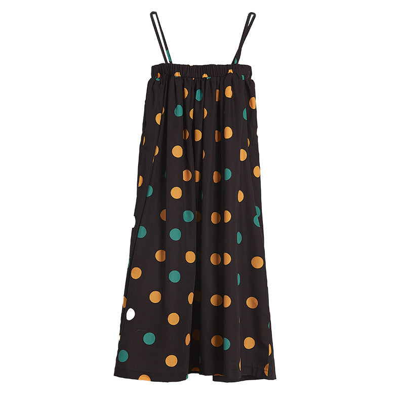 A vibrant girls' long dress featuring a colorful polka dot pattern, perfect for summer wear.