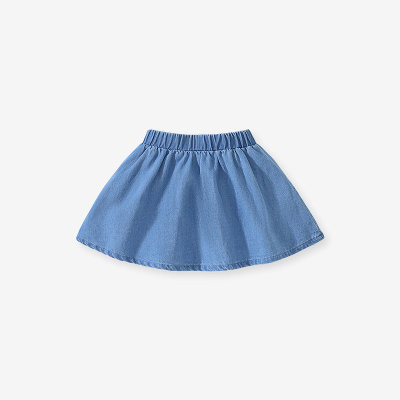 Girls denim skirt featuring unicorn and rainbow cartoon embroidery, perfect for summer wear.