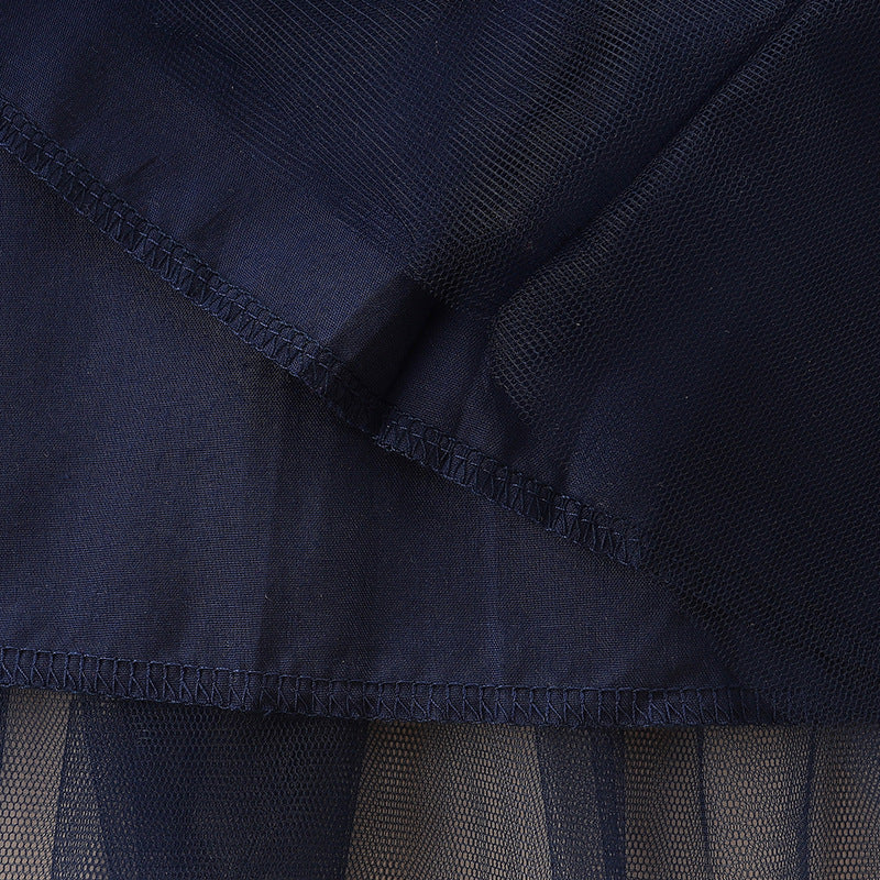 Girls’ outfit featuring Santa Claus and reindeer embroidery in black and red cotton, perfect for festive occasions.