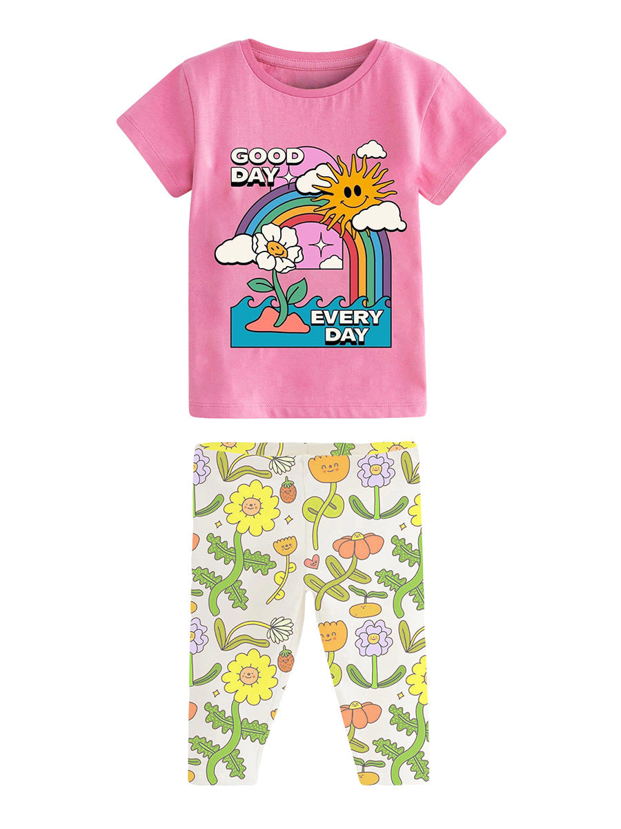 Girls Sunny Day Cartoon T-Shirt and Floral Capri Pants Set in pink, featuring a playful cartoon design and floral patterns, perfect for spring and summer.