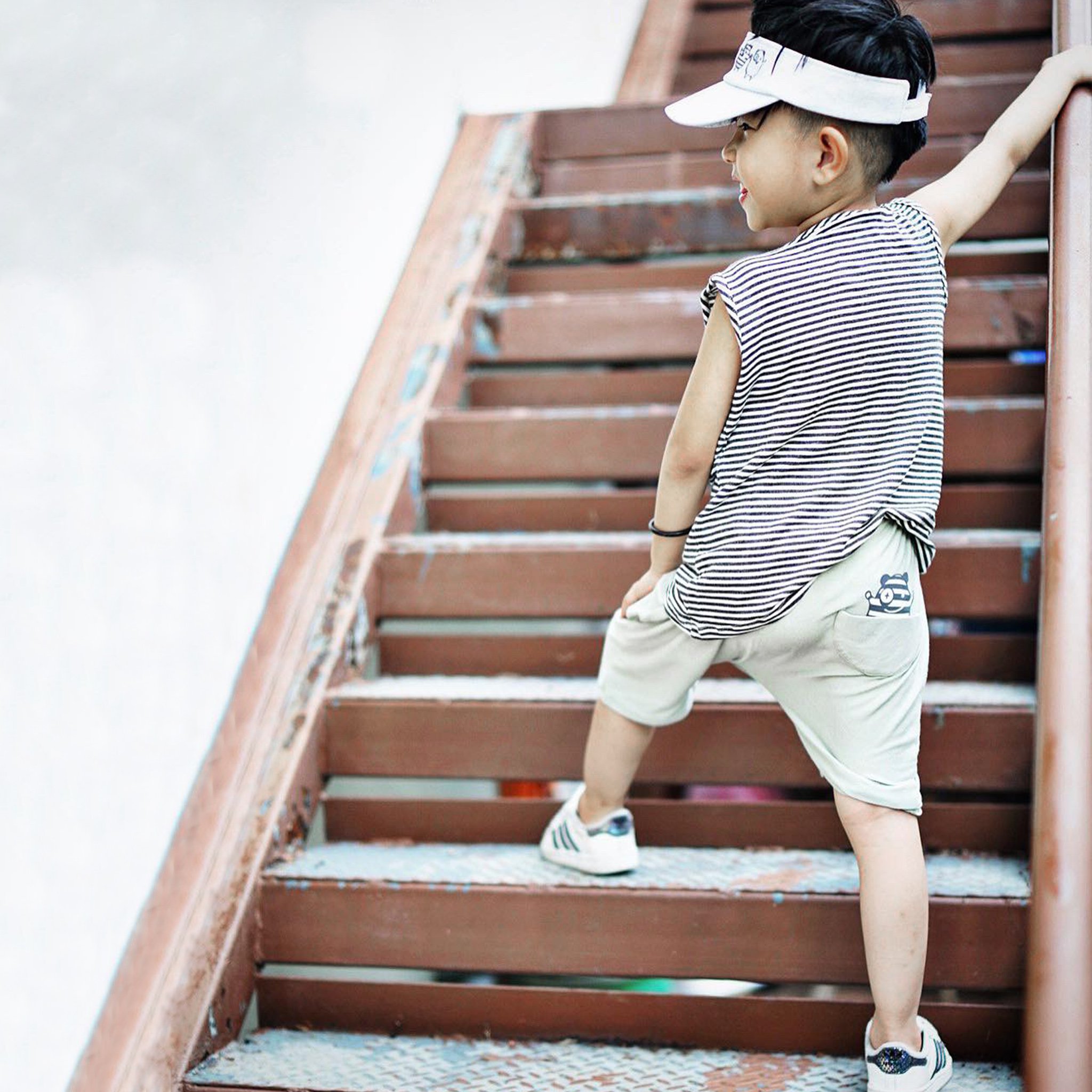 Hammer Shorties in Desert Sage featuring a monster peek-a-boo back pocket and drop crotch harem style, made from super soft fabric.