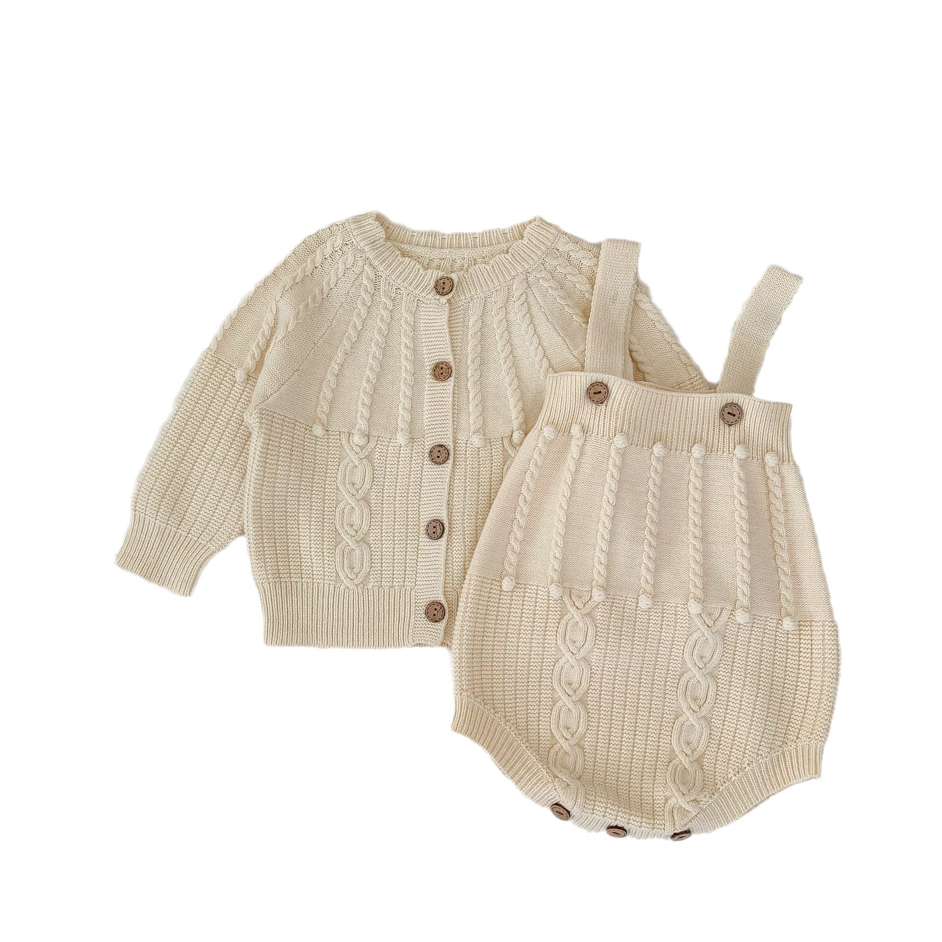A handmade knitted cardigan set for baby girls, featuring a white and red color scheme, crafted from soft cotton material.
