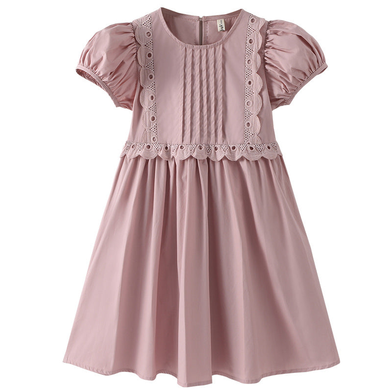 A vibrant pink cotton dress for girls, perfect for summer, featuring a simple and stylish design suitable for various occasions.