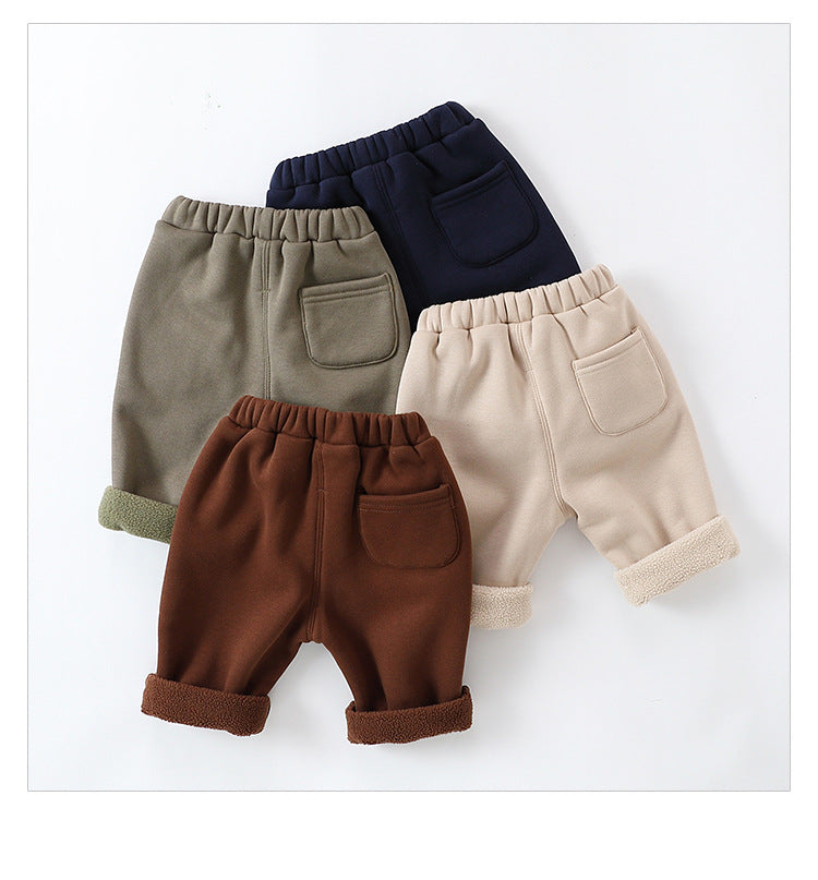 Infant baby girls velvet winter pants in four colors: navy blue, green, apricot, and brown, showcasing soft fabric and stylish design.