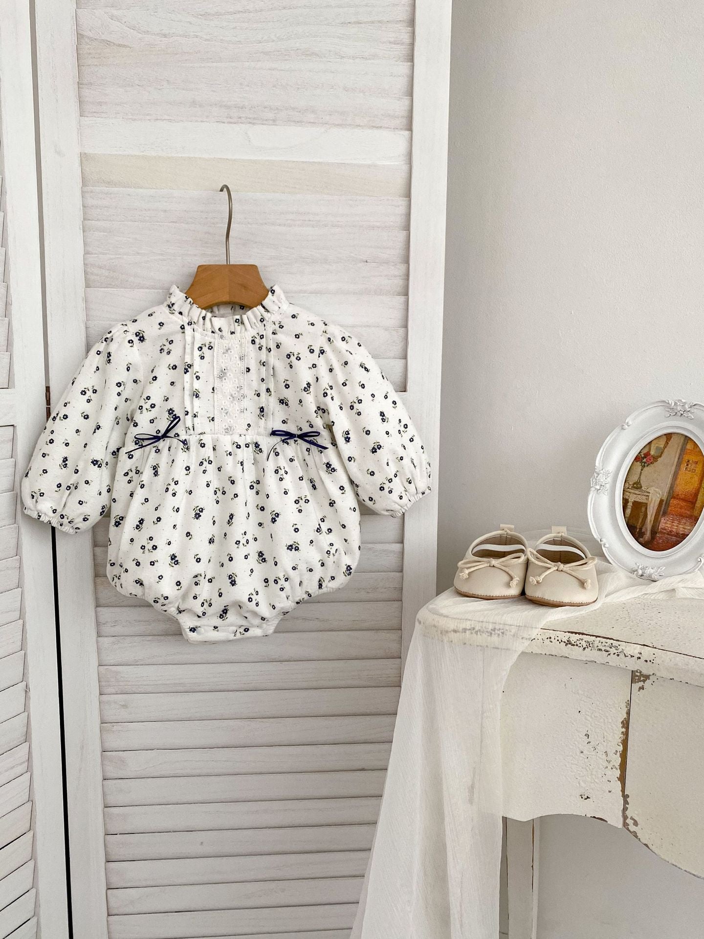 Infant baby girls long sleeve one piece with floral design in white, perfect for winter wear.