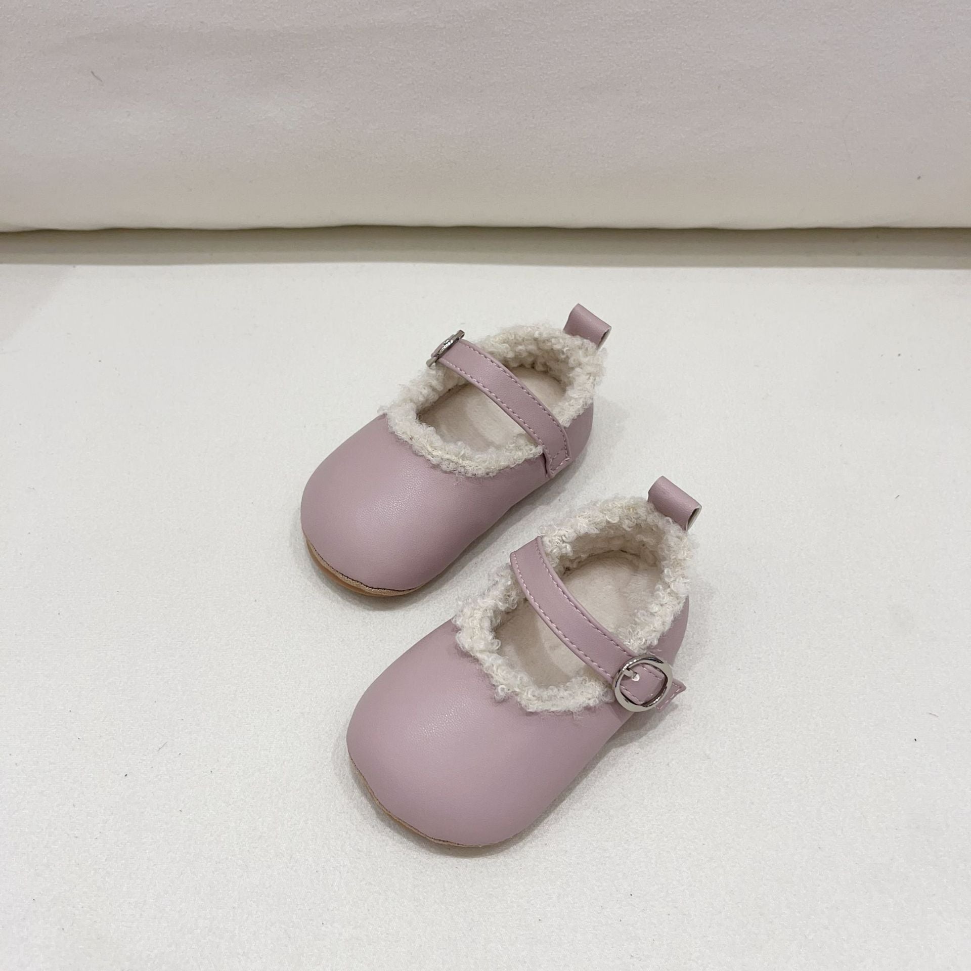 Infant baby girl plush warm anti-slip shoes in various colors including black, purple, yellow, beige, and brown, perfect for winter.