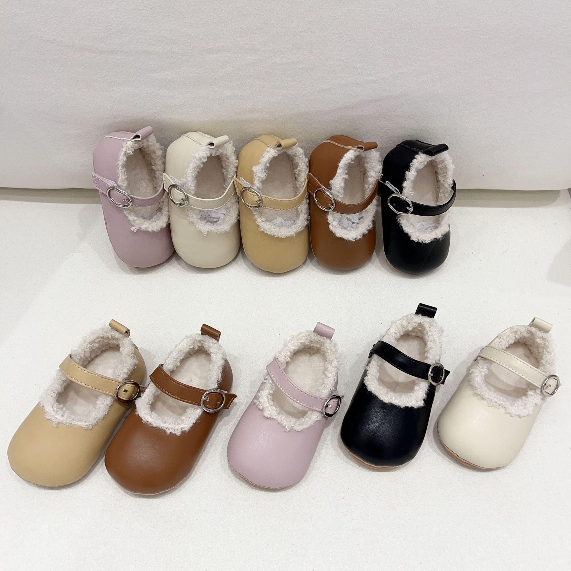 Infant baby girl plush warm anti-slip shoes in various colors including black, purple, yellow, beige, and brown, perfect for winter.