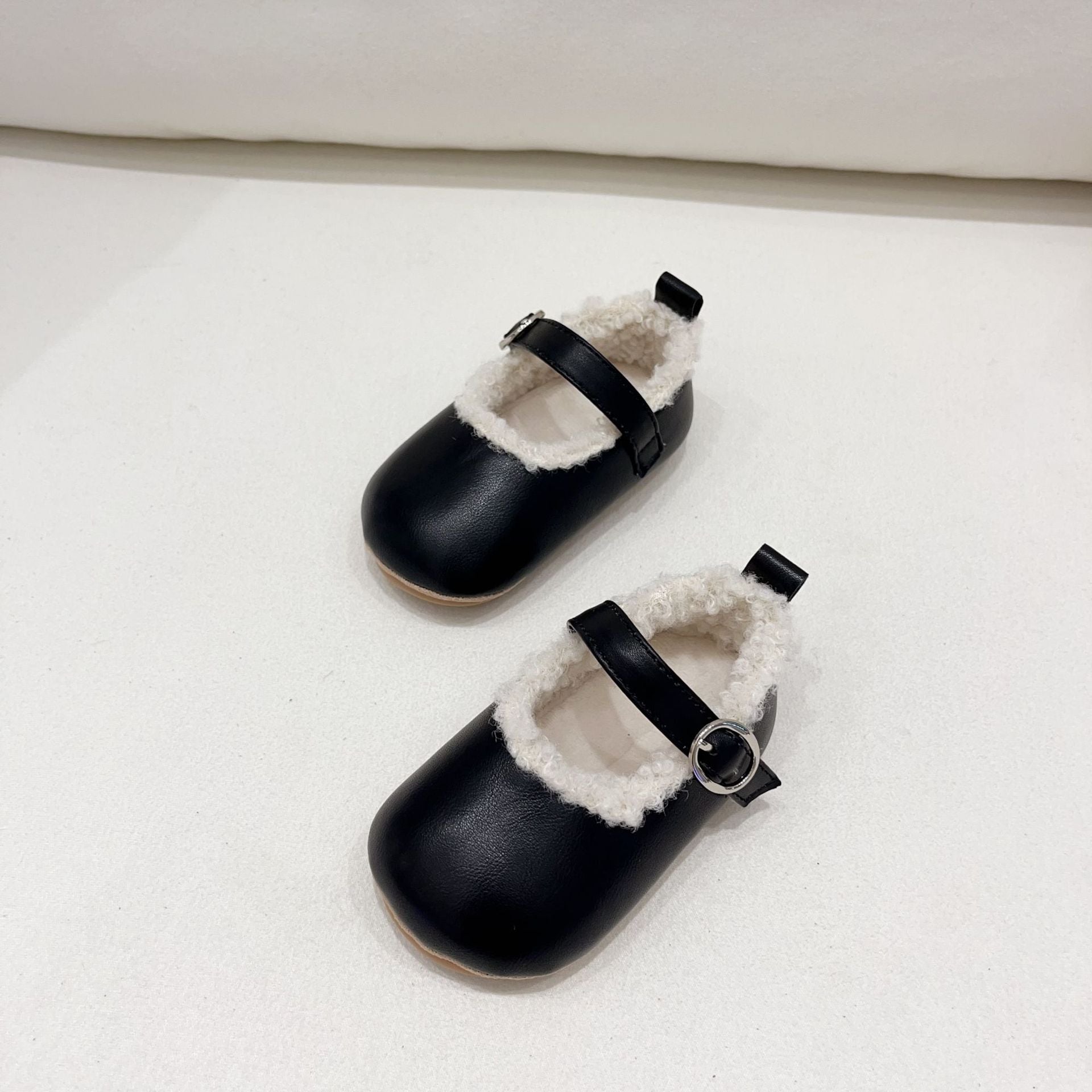 Infant baby girl plush warm anti-slip shoes in various colors including black, purple, yellow, beige, and brown, perfect for winter.