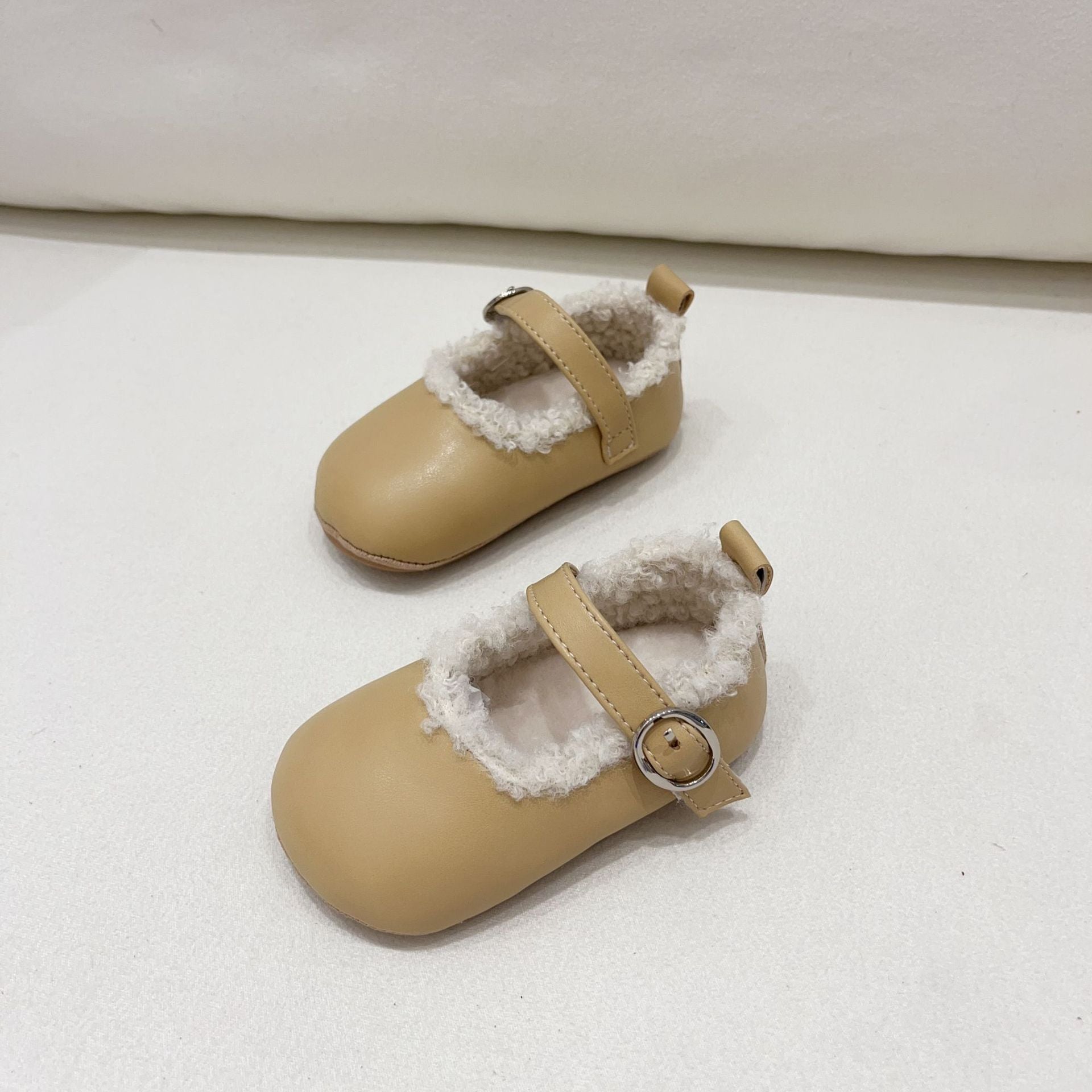 Infant baby girl plush warm anti-slip shoes in various colors including black, purple, yellow, beige, and brown, perfect for winter.