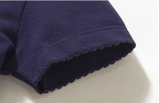 Kids’ Collar Flip Pure Cotton Star Logo shirt in white, pink, and navy blue, showcasing polka dot and embroidered patterns.